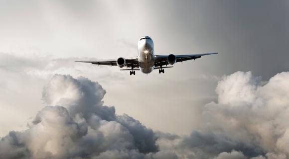 jet_airplane_flying_from_storm